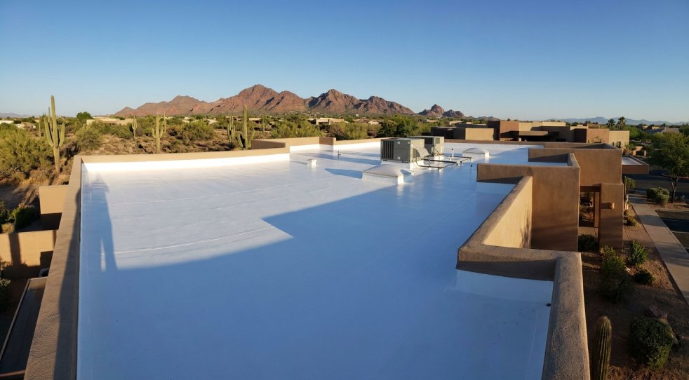 Flat roof on a desert home in Mesa, Arizona with rooftop HVAC units and mountain views